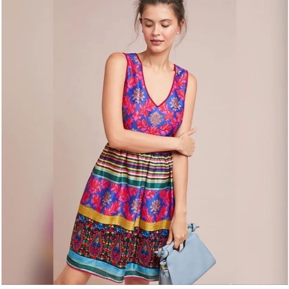 Colorful v-neck dress with beading and embroidery.